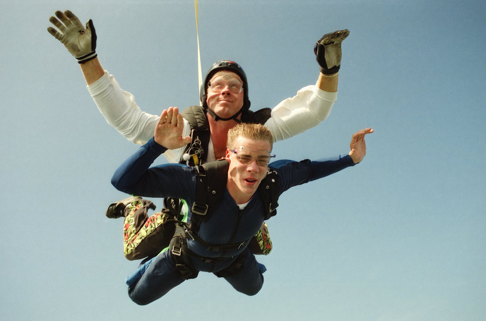 duo of sky divers falling down